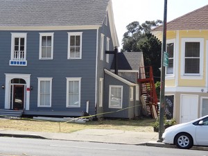 Locals worked to clean up this house on Jefferson St. in Napa, which had its foundation and side staircases damaged by the M6.0 Napa earthquake. 