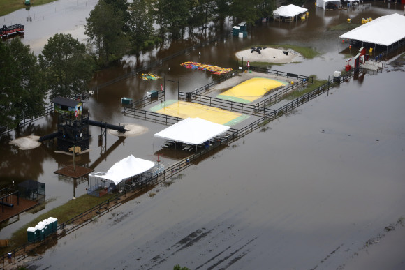 The farms and playground area for picking pumpkins are swamped in Mt. Pleasant, S.C., Monday, Oct. 5, 2015. South Carolina is still struggling with floodwaters due to a slow moving storm system. (AP Photo/Mic Smith)