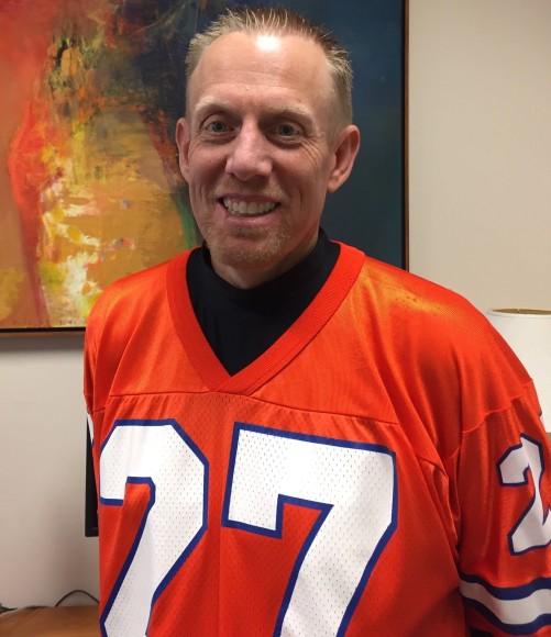Kent Fortune, vice president and general manager of USAA Colorado Springs, sporting his Denver Broncos jersey. 