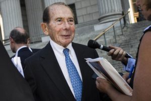 Maurice "Hank" Greenberg, former chairman of American International Group Inc., speaks with members of the media after exiting Supreme Court of the State of New York in New York, U.S., on Tuesday, Sept. 13, 2016. More than 11 years after he was sued by former New York Attorney General Eliot Spitzer, Greenberg went on trial Tuesday to fight claims that he and former Chief Financial Officer Howard Smith rigged the books with two sham transactions at AIG to hide the insurer's true financial condition. Photographer: John Taggart/Bloomberg