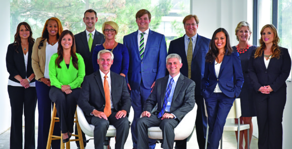 Kapnick client advocates and executive team members with CEO Jim Kapnick (front left) and President/COO Mike Kapnick (front right)