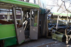 KYIV, UKRAINE, MARCH 20, 2022: After bombing. War in Ukraine. Russian missile destroyed trolleybus in Kyiv city on March 14, 2022. Terror and genocide of Ukrainian people