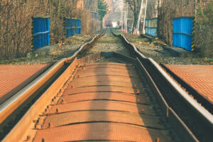 crooked old railway track railing