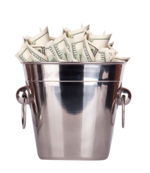 Bucket with money on white background Isolated