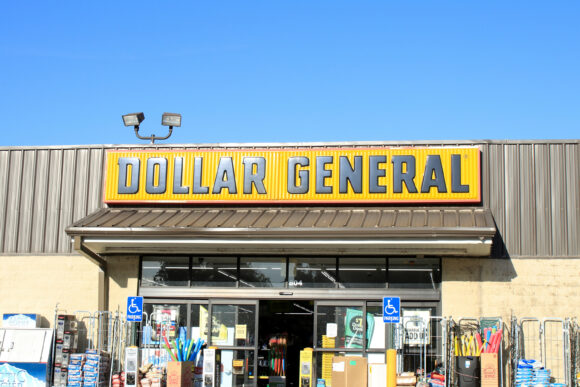A sign advertising the DOLLAR GENERAL store in Sterling Kansas U