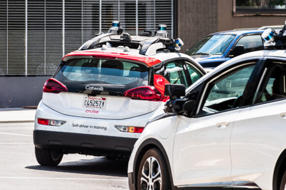 Cruise (owned by General Motors) self driving vehicles performing tests on the city streets; The company is using re-branded Chevrolet Bolt vehicles