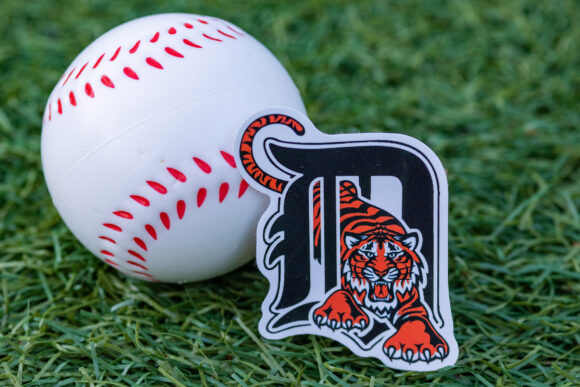 September 26, 2022, Cooperstown, New York. The emblem of the Detroit Tigers baseball club and a baseball.