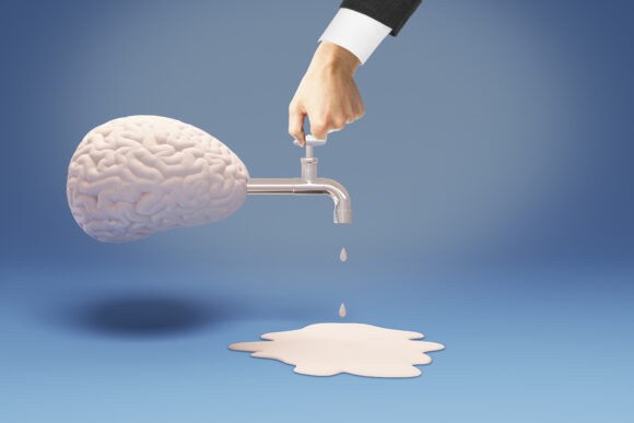 Brain drain concept with businessman hand on tap coming out of abstract brain on blue background. 3D Rendering