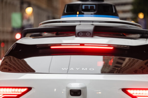 SAN FRANCISO, CALIFORNIA, USA – FEBRUARY 3, 2024: Waymo Self driving taxi car in Downtown San Francisco during it's ride