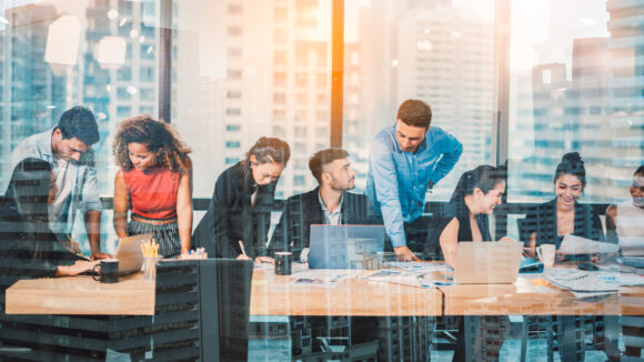 Double exposure city of Group of business people working in conference room.team of successful business people.Meeting Discussion Strategy Working Concept.