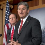 Sen. Joe Manchin, D-W.Va., right, accompanied by Sen. Patrick Toomey, R-Pa., announce that they have reached a bipartisan deal on expanding background checks to more gun buyers, Wednesday, April 10, 2013, on Capitol Hill in Washington.  (AP Photo/J. Scott Applewhite)