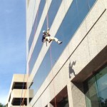 USI MidAtlantic Chief Financial Officer Chris Hearn rappels off the SunTrust building in Richmond, Va.