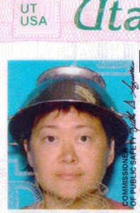 Asia Lemmon, whose legal name appears on her drivers license as Jessica Steinhauser, is shown wearing a metal colander on her head on her Utah driver's license.  Lemmon says the pasta strainer represents her beliefs in the Church of the Flying Spaghetti Monster and says state employees  took the photo after she presented them with documents on religious freedom. (AP Photo/Utah Department of Motor Vehicles via The Spectrum)